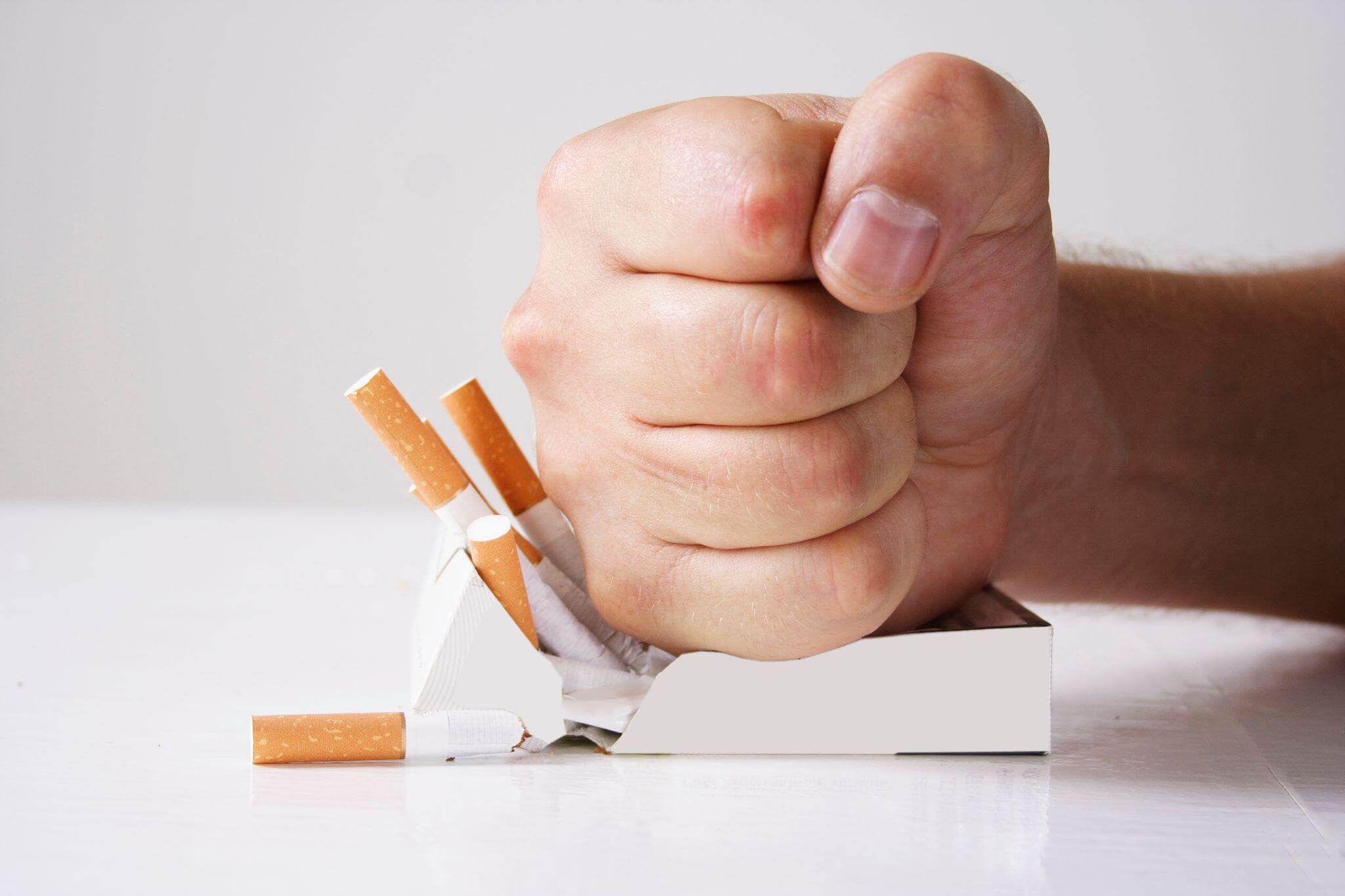 Smashing a cigarette box