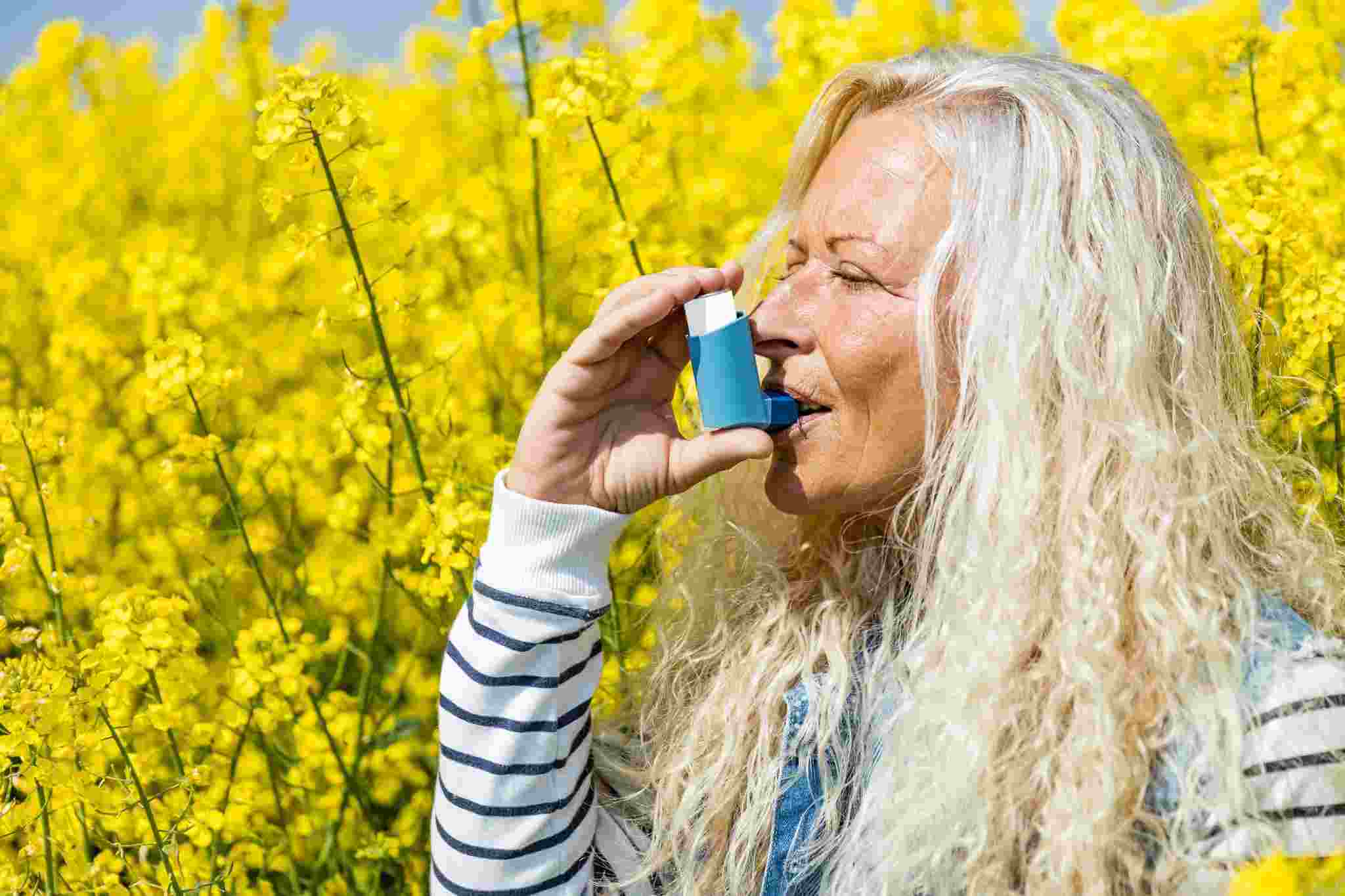 woman using an inhaler