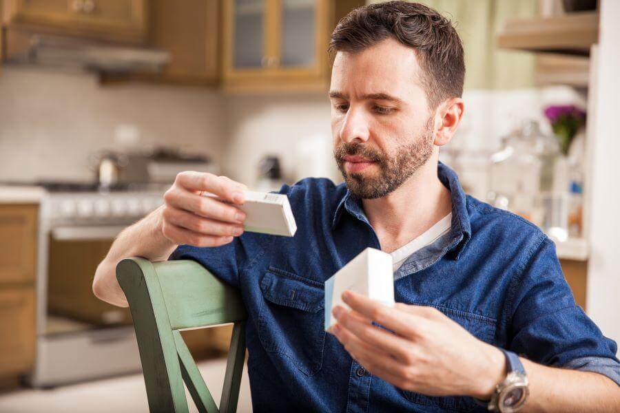 man wondering the differences of Prednisone vs Prednisolone